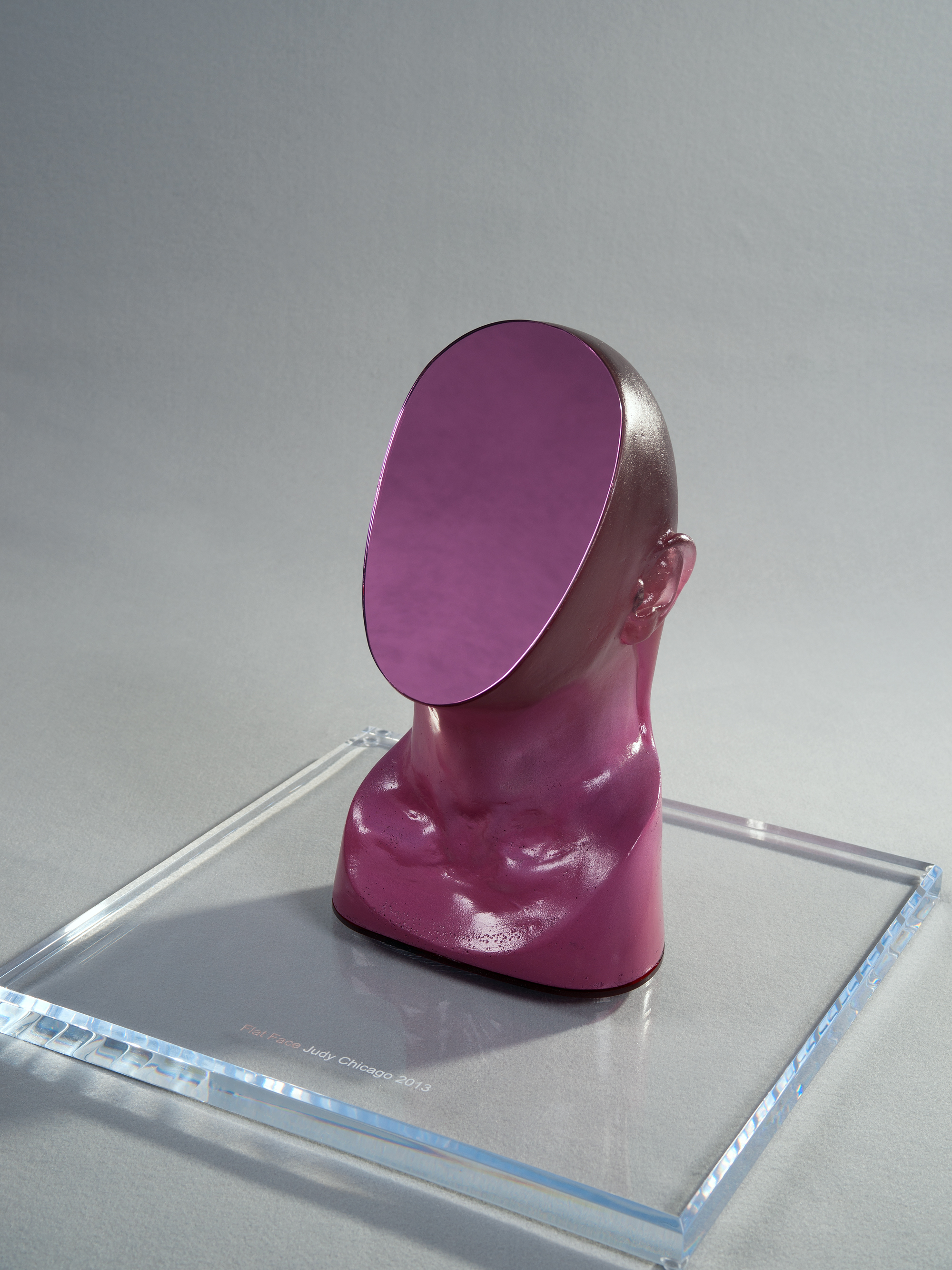 Heads Up Judy Chicago Judy Chicago Flat Face From Heads Up 2018 Cast Glass Enamel Mirror And Plexiglas On Acrylic Base Installed Size 15 5 X 16 In